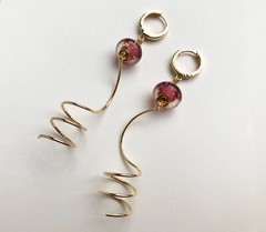 Unmatched earrings dangle, large spiral earrings gold tone