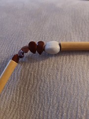 Natural materials necklace with bamboo tubes, seeds, and shell beads