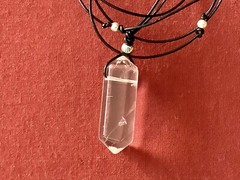 Quartz Crystal Point Pendant with Black Leather Cord Adorned with S.S. Beads.