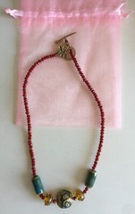 NEW Handmade Necklace Red Gold Green Amber Beads + pink gift bag