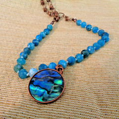 Artisan crafted,Abalone pendant on 18” faceted apatite and copper strand. Beauti