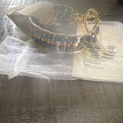 Handmade Bracelet Made With Small Blue Crystal And Gold Beads.