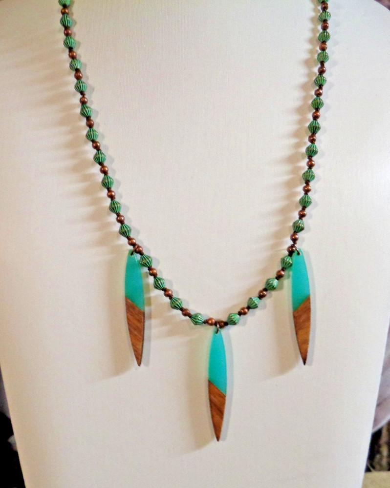 Artisan crafted, 20” green patina bicones, spacers are antique copper, and 3 pen