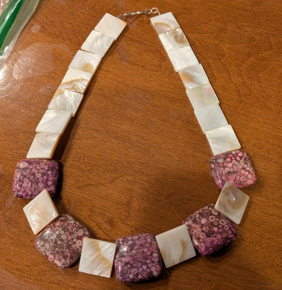 Artesian made purple Crinold fossil and MOP Necklace & Earrings