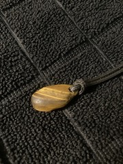 Tigers Eye Natural Handmade Polished Pendant On A Black Cord Necklace