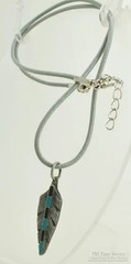Pewter-toned base metal enamel feather pendant with a grey leatherette necklace