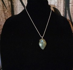 Artisan crafted 1 ¼» Labradorite pendant, on 19” silver plated snake chain, with