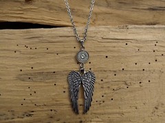Wing Bullet Necklace with 9 mm or 45 Auto Bullet. Optional Crystal.