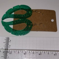 Handmade epoxy resin dangle wing earrings – green glitter