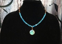 Artisan crafted,Abalone pendant on 18” faceted apatite and copper strand. Beauti