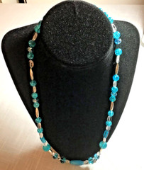 Beautiful Turquoise Necklace. 23 1/2″ long. Unique design . Makes a great gift!