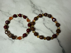 set of 2 red brown, gold and amber tones beaded bracelets handmade