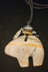 Artisan Carved Picasso Stone Bear Pendant With Silver Charm Feathers