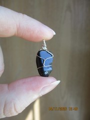 Unknown stone sterling silver wire wrapped pendant