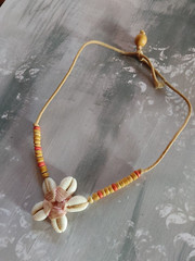 Vintage Necklace cowrie shell beads flower shape woven tie-on cord no metal