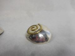 COURTNEY PETERSON STERLING SILVER & BRASS SPIRAL SHELL PIERCED EARRINGS