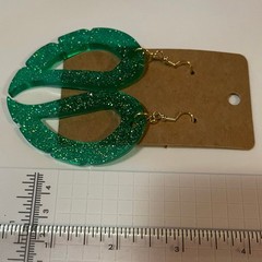Handmade epoxy resin dangle wing earrings – green glitter