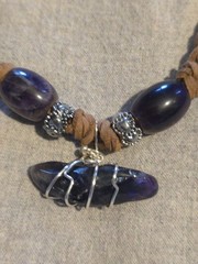 Amethyst Pendant On A Hand Braided Brown Leather Necklace