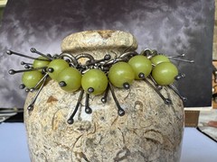 Artist made, sterling silver and green glass contempory bracelet