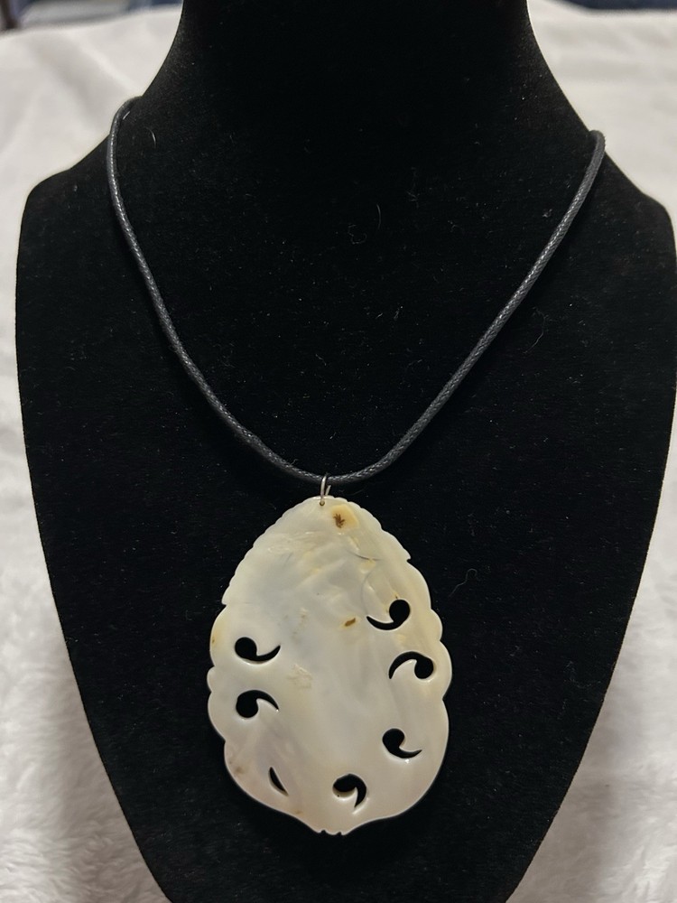Mother Of Pearl Carved Pendant Necklace On Black Cord
