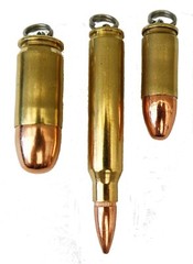 Three Bullet pendants or key rings 9mm, 223 cal and 45