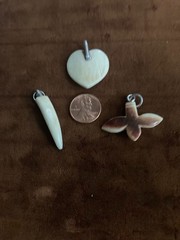 ANTIQUE HAND CARVED NEPALESE TOOTH, FLOWER AND HEART PENDANTS