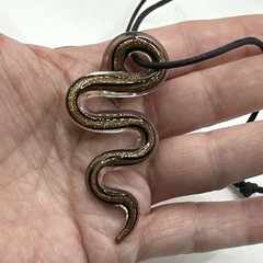 Art Glass Metallic Bronze Black Clear Colored Snake Pendant On Cord