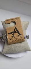 this fair trade jewelry is handmade in Kenia from recycled and natural materials
