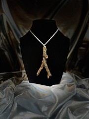 One of a kind jewelry made from real pieces of wood coated in resin