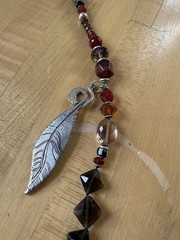 Jes Maharry Silver Pedant Necklace And Brown And Red Gemstones And Feather Charm