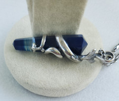 Sterling Silver Pendant of Dolphin pair clutching blue banded Agate crystal
