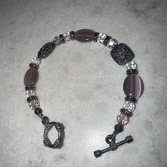 Handmade Purple and clear colored stone 7 inch bracelet.
