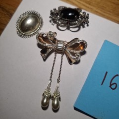 Sterling silver vintage brooch Pin lot Bow Lot Of 3. 46.8 grams Costume jewelry.