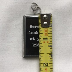 Handmade Reversible Soldered Pewter Charm Pendant “Here’s lookin’ at you kid!”