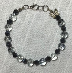 Handcrafted Clear & Black Beaded Bracelet w/ Silver Lobster Clasp. Adjustable .