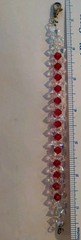 Made with Swarovski 6mm Bicone Beads AB Crystal & Lt Siam (Red) Fits7 1/2″ Wrist