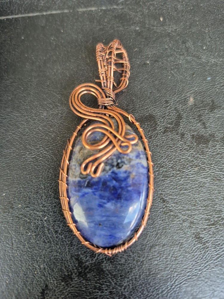 Sodalite Gemstone Pendant Wrapped In Copper Wire