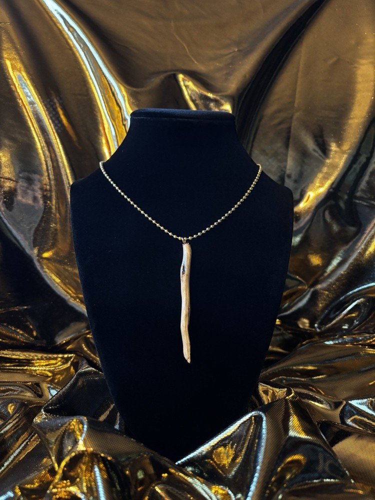One of a kind jewelry made from real pieces of wood coated in resin