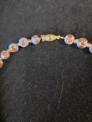 A Handmade 19 Inch Purple And Gold Necklace With 18 Carat Gold Plated Clasp