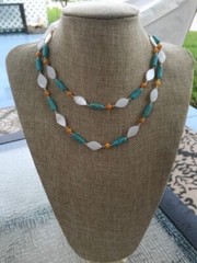 Long Necklace of White and Orange Shell Beads with Turquoise Magnesite Stone