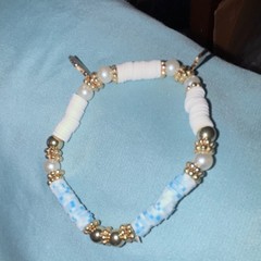 White & baby blue with gold Spacers