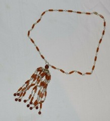 Orange, Red, and Imitation Pearl Bead Necklace, 28 in with 5 1/2 in tassel drop