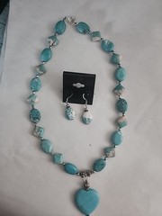 Handmade turquoise beaded necklace and earring set featuring irregularly shaped
