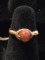 Handmade sizes 4 – 15 Wire-Wrapped Goldstone Rings with Gold-Tone Plated Wire