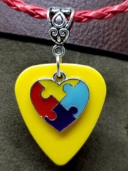 Autism Awareness Heart Charm on Yellow Guitar Pick Necklace on Red Braided Cord