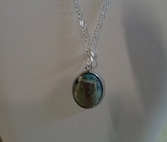Artisan crafted,1” oval agate cab in stainless bezel, on 22” delicate silver pla