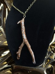 One of a kind jewelry made from real pieces of wood coated in resin