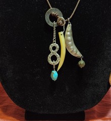 Chan Luu artisan bohemian cluster of charms and dark Brown Leather cord Necklace
