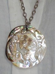 28″ Long Necklace with 1 3/4″ across Carved Mother Of Pearl Koi Fish Medallion