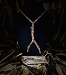 One of a kind jewelry made from real pieces of wood coated in resin